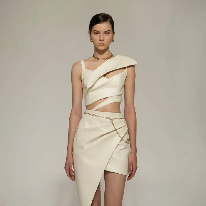 Asymmetrical pieces like one-shoulder tops and skirts bring boldness to your wardrobe