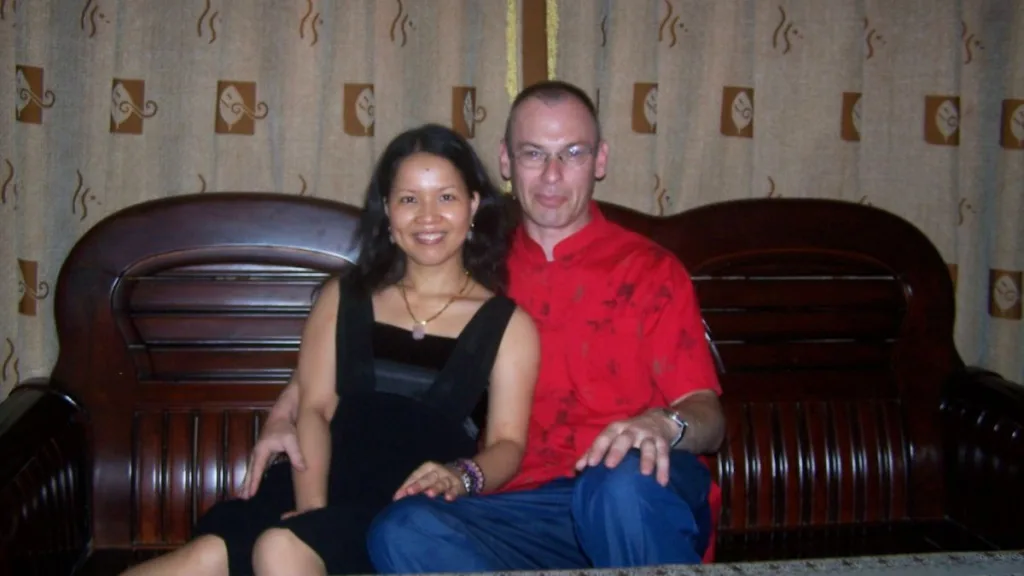 Happy couple wedded 18 years ago, sharing marriage advice after 18 years together.