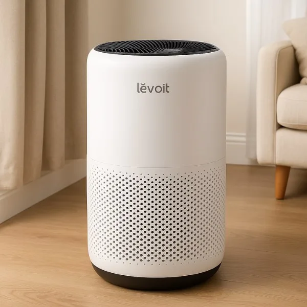 Mindful home organization — Levoit air purifier placed in a calm, organized living room to promote clean air and a peaceful home environment.